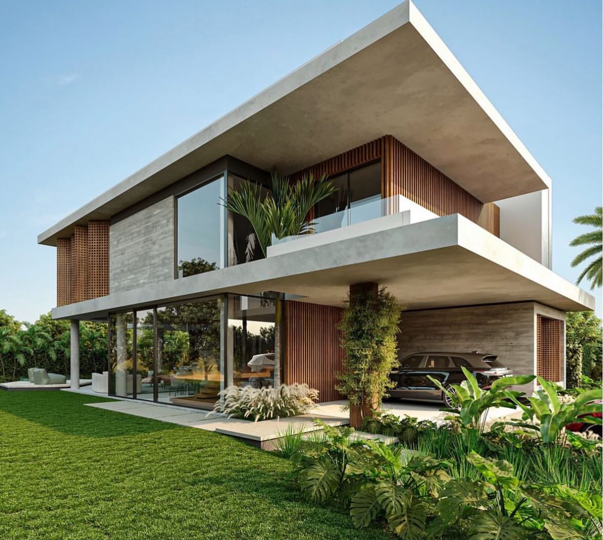 Modern house with a garage and garden area on a clear day