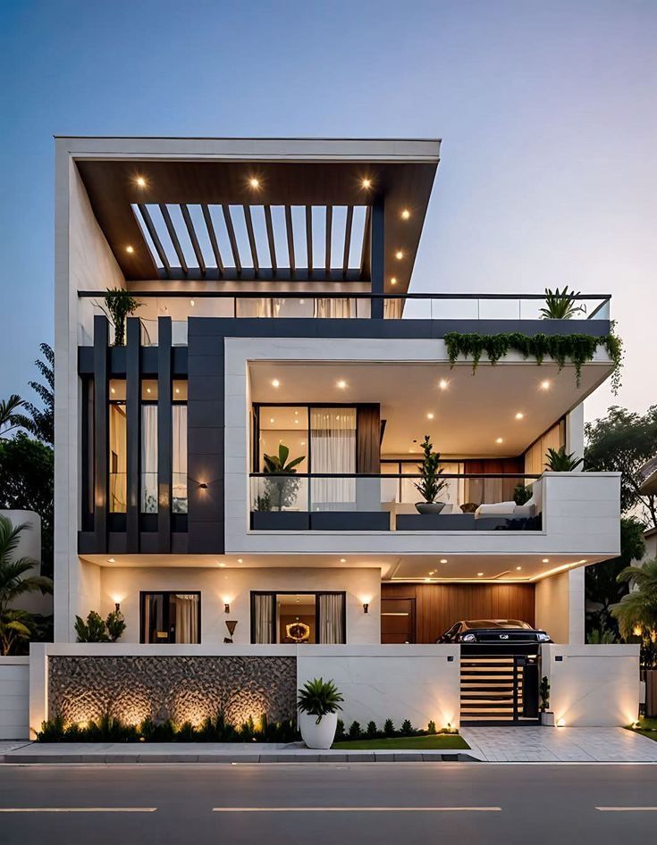 Modern house exterior with balconies and decorative elements at dusk.