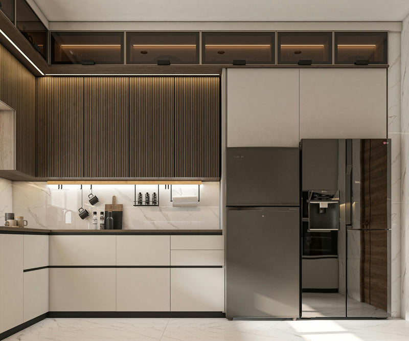 Modern kitchen with stainless steel refrigerator and neutral color scheme